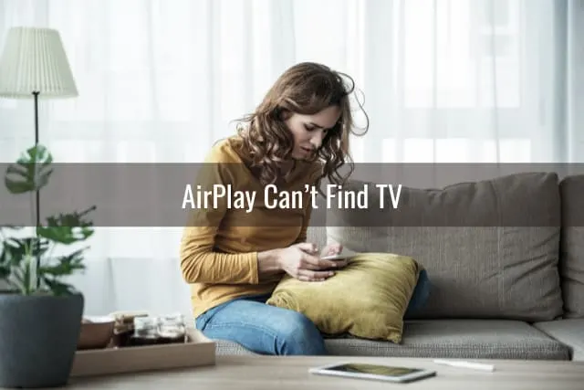 Frustrated woman while holding a phone