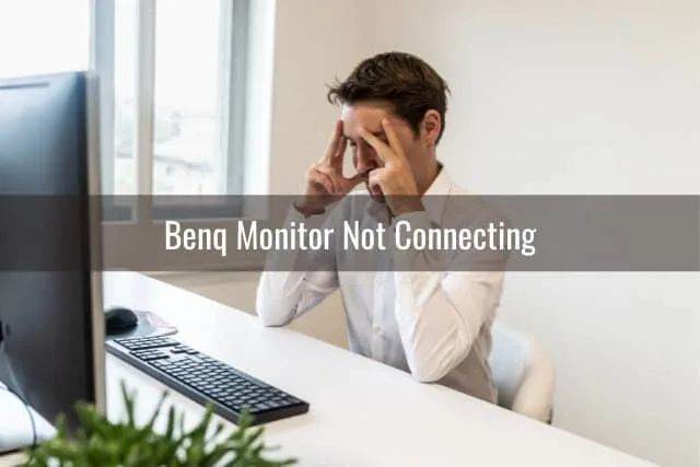 Frustrated man while looking at the monitor