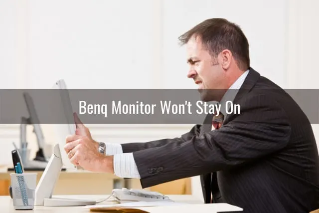 Frustrated man while looking at the monitor