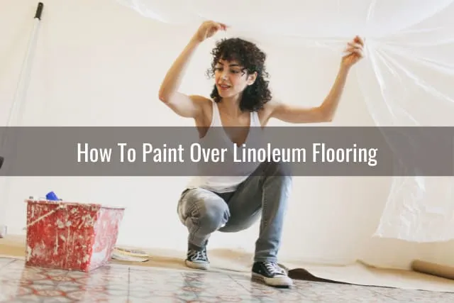 Woman painting the floor