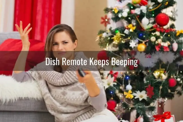 woman holding a remote