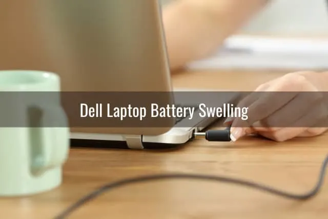Plugging the charger in the laptop