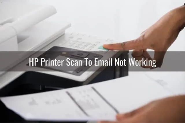 Finger pressing printer buttons