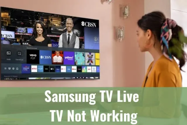 woman watching tv while holding a remote