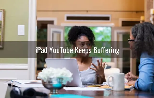 Woman confused while holding an ipad