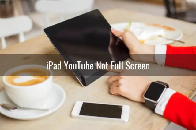 Man holding ipad