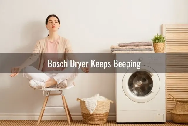 Woman meditating next to dryer machine
