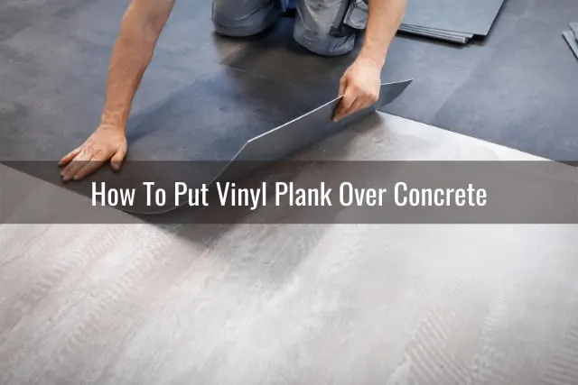 Man putting vinyl tile on the floor