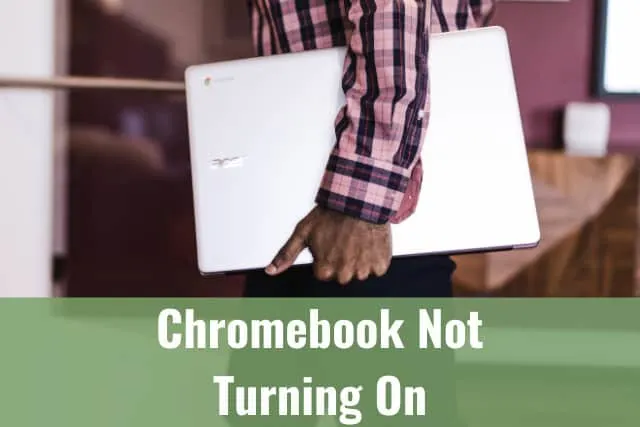 Man holding a laptop