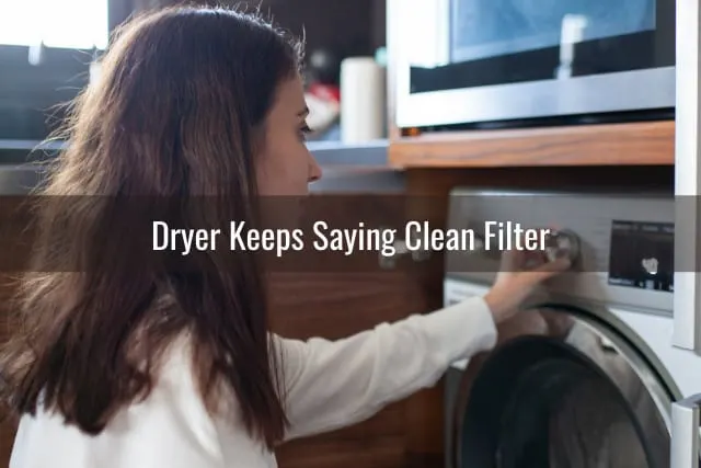 Woman adjusting the dryer