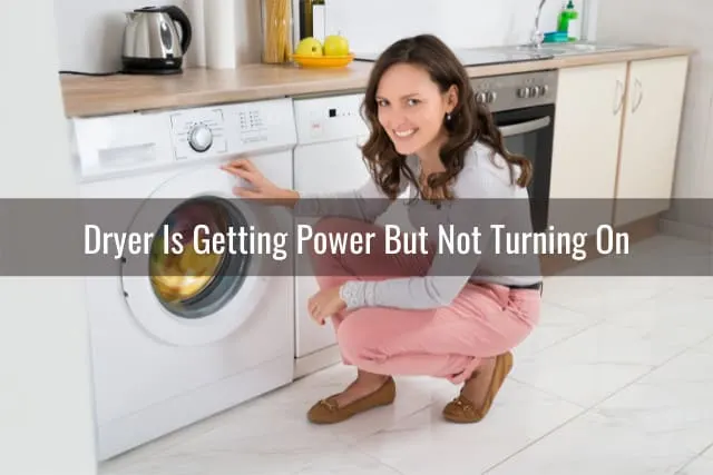 Woman adjusting the dryer