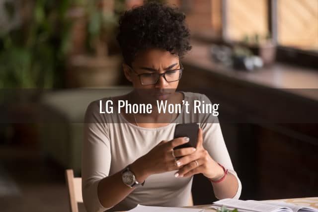 Confused woman holding a phone