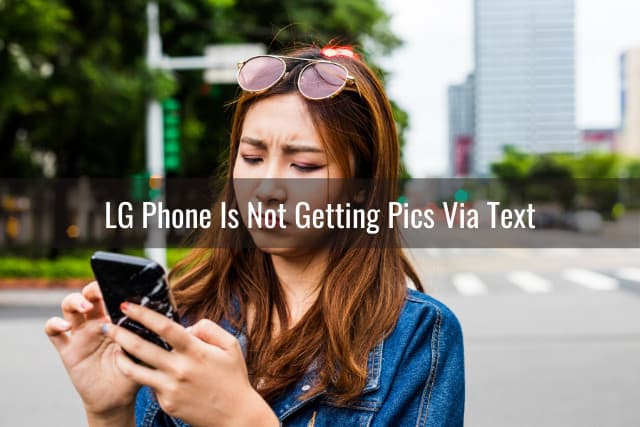 Confused woman holding a phone