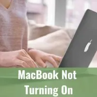 Woman typing to her laptop
