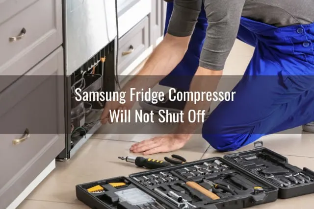 Man fixing the back of the fridge