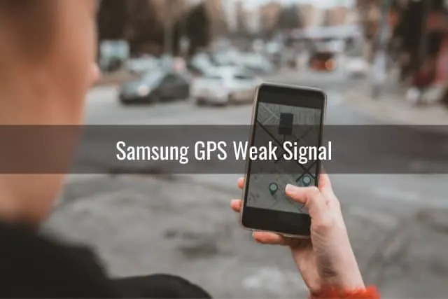 Holding a phone while looking at the Map