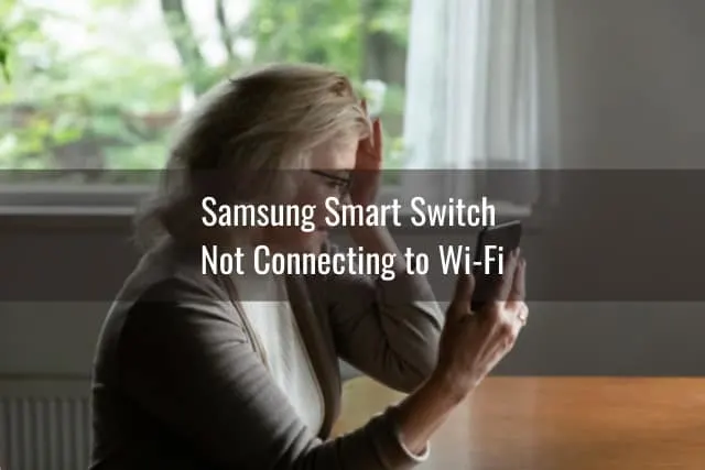 Confused woman holding a phone