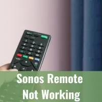 Holding a remote while pointing in the TV