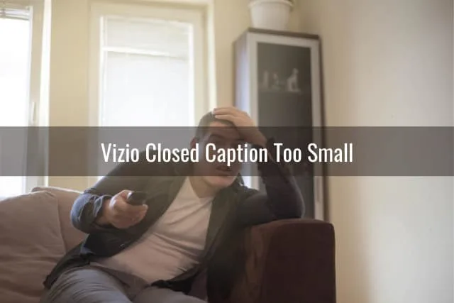 Frustrated man watching TV