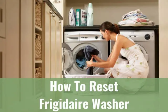 Woman putting clothes in washing machine