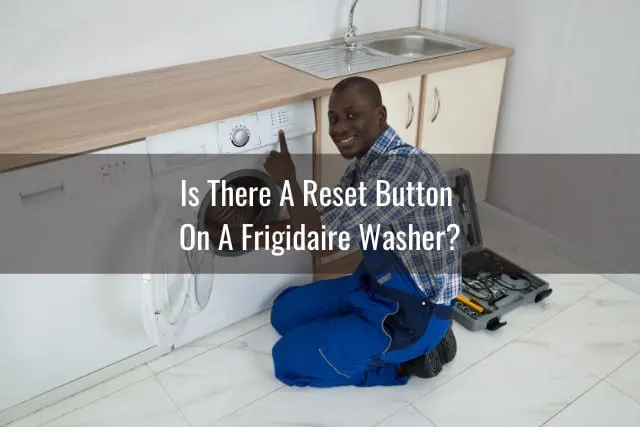 man fixing the washing machine