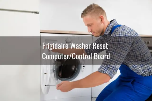 man fixing the washing machine