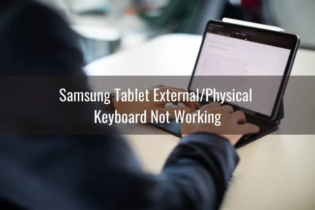 Man typing in the tablet keyboard