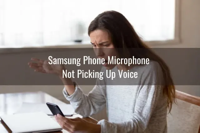 frustrated woman holding a phone