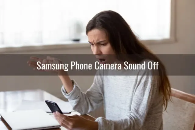 frustrated woman holding a phone