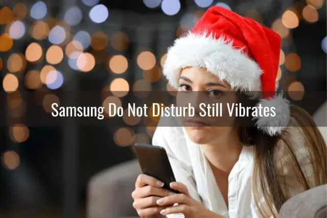 Confused woman holding a phone
