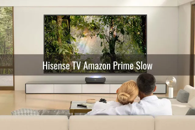 Couple watching tv in the living room