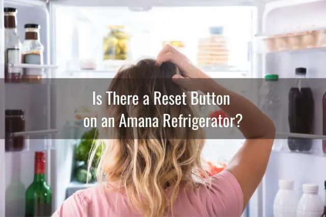 Confused woman looking at the refrigerator