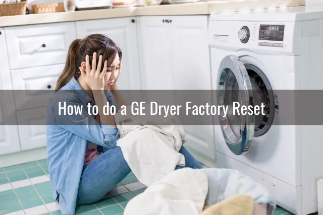 Frustrated woman looking at the dryer