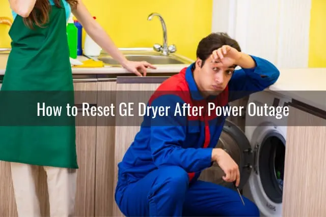 man fixing the dryer