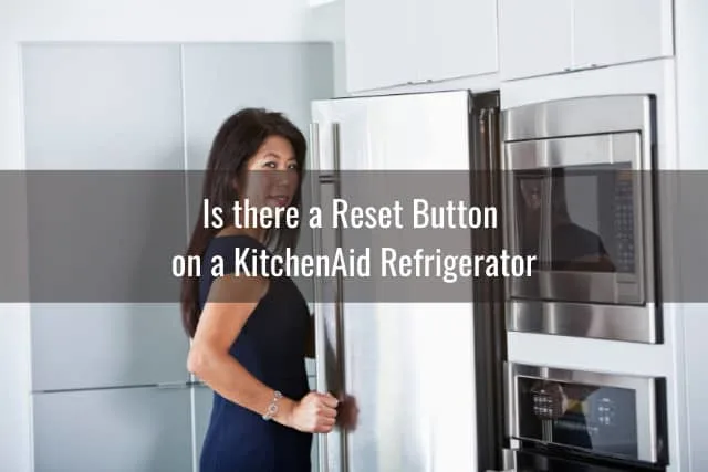 Woman checking the refrigerator