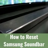 Black Soundbar below the flatscreen