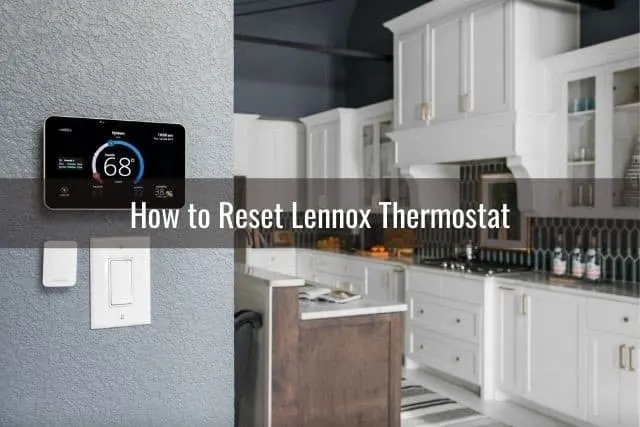 Kitchen with thermostat on wall