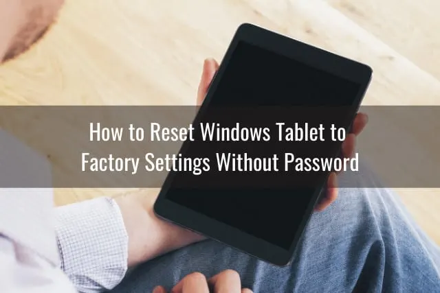 Holding a black tablet