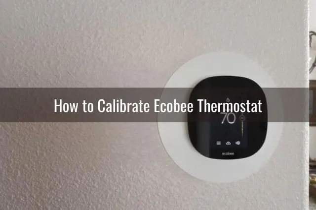 White Thermostat on the wall