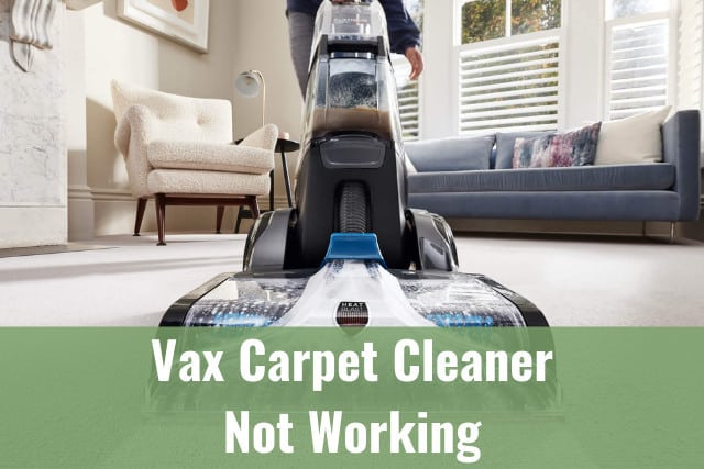 Cleaning the carpet using Vax