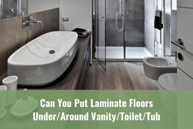 Can You Put Laminate Floors Under Around Vanity Toilet Tub Ready To Diy - Can U Use Laminate Flooring Bathroom
