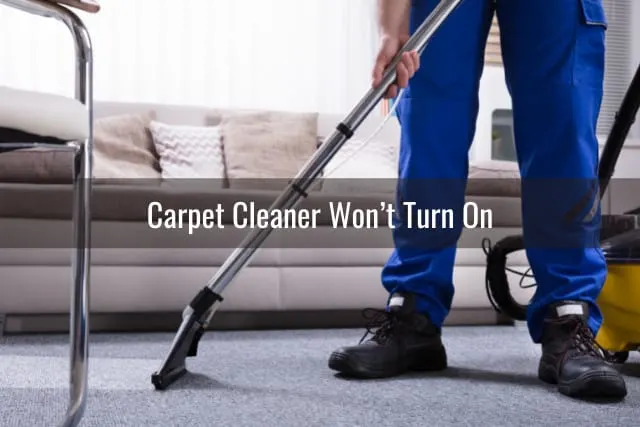 man cleaning the carpet
