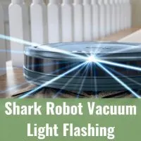 Black vacuum light flashing while cleaning the floor