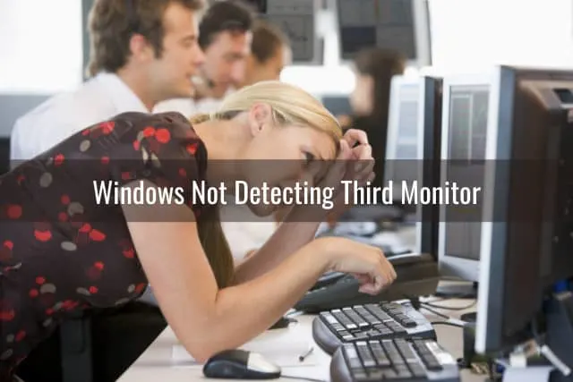 Frustrated woman looking at the monitor