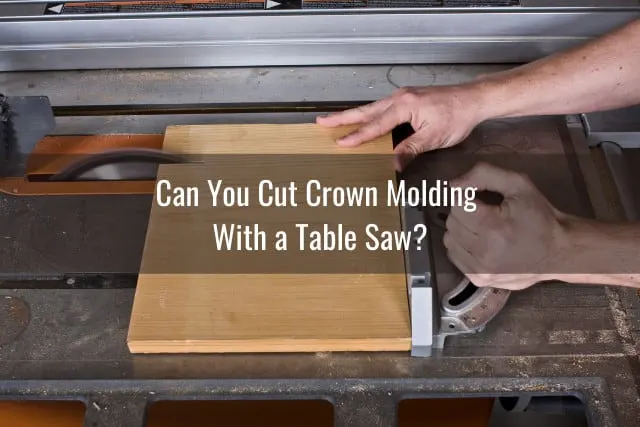 Man cutting the crown molding