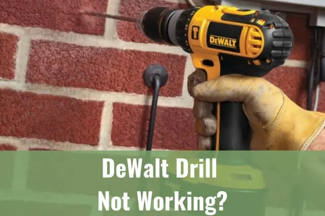 Man using drill in the wall