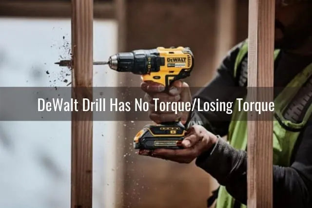 Man using drill in the wood