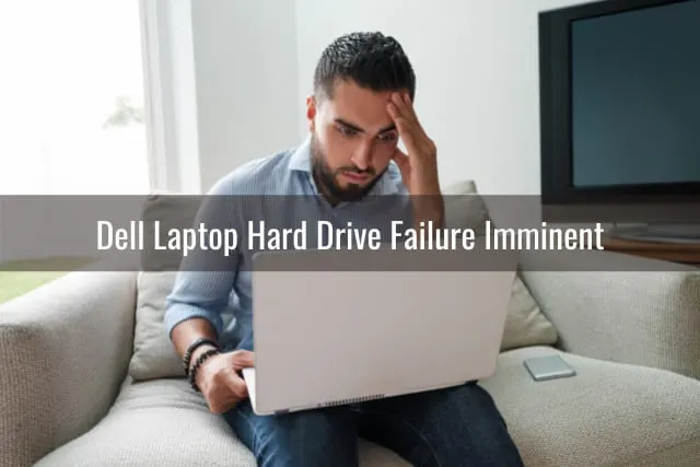 man looking at her laptop