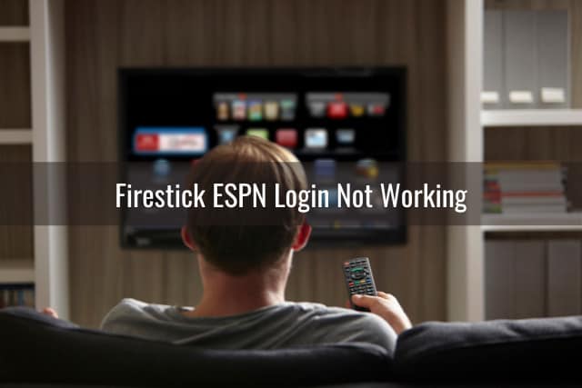 Man watching tv while holding a remote