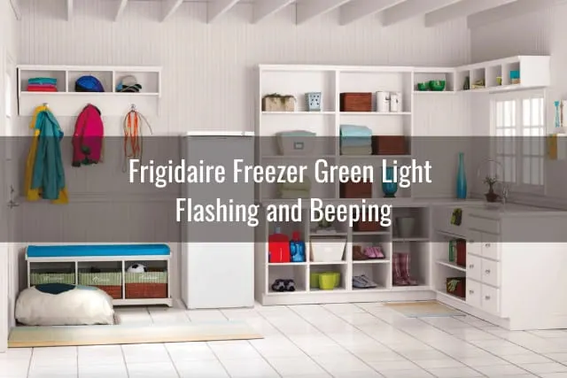White Frigidaire with frozen food inside